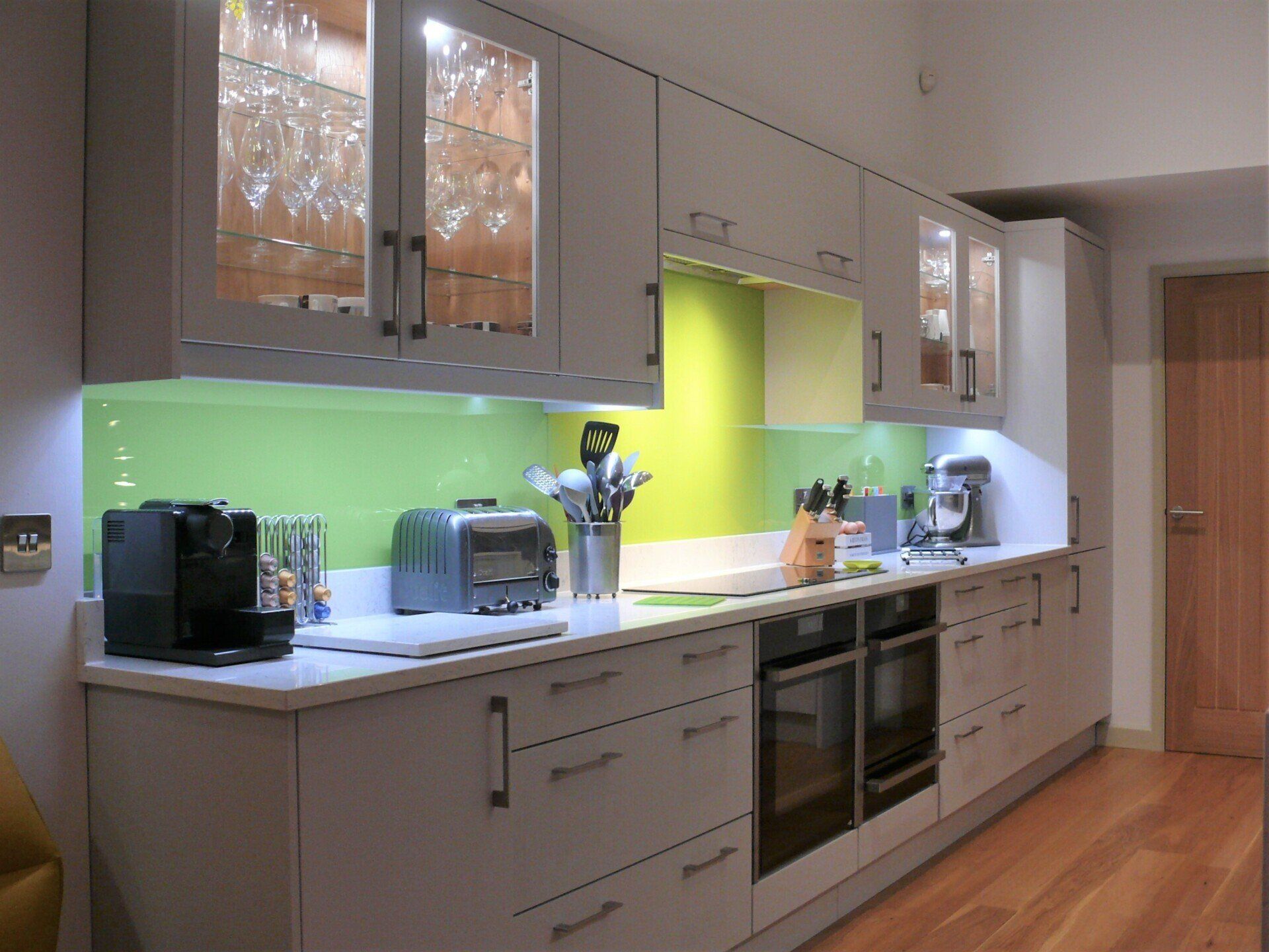 Valentino Kitchens Dulcote Pale Smoked painted oak, pantry, Silestone quartz island, Neff, Fisher & Paykel