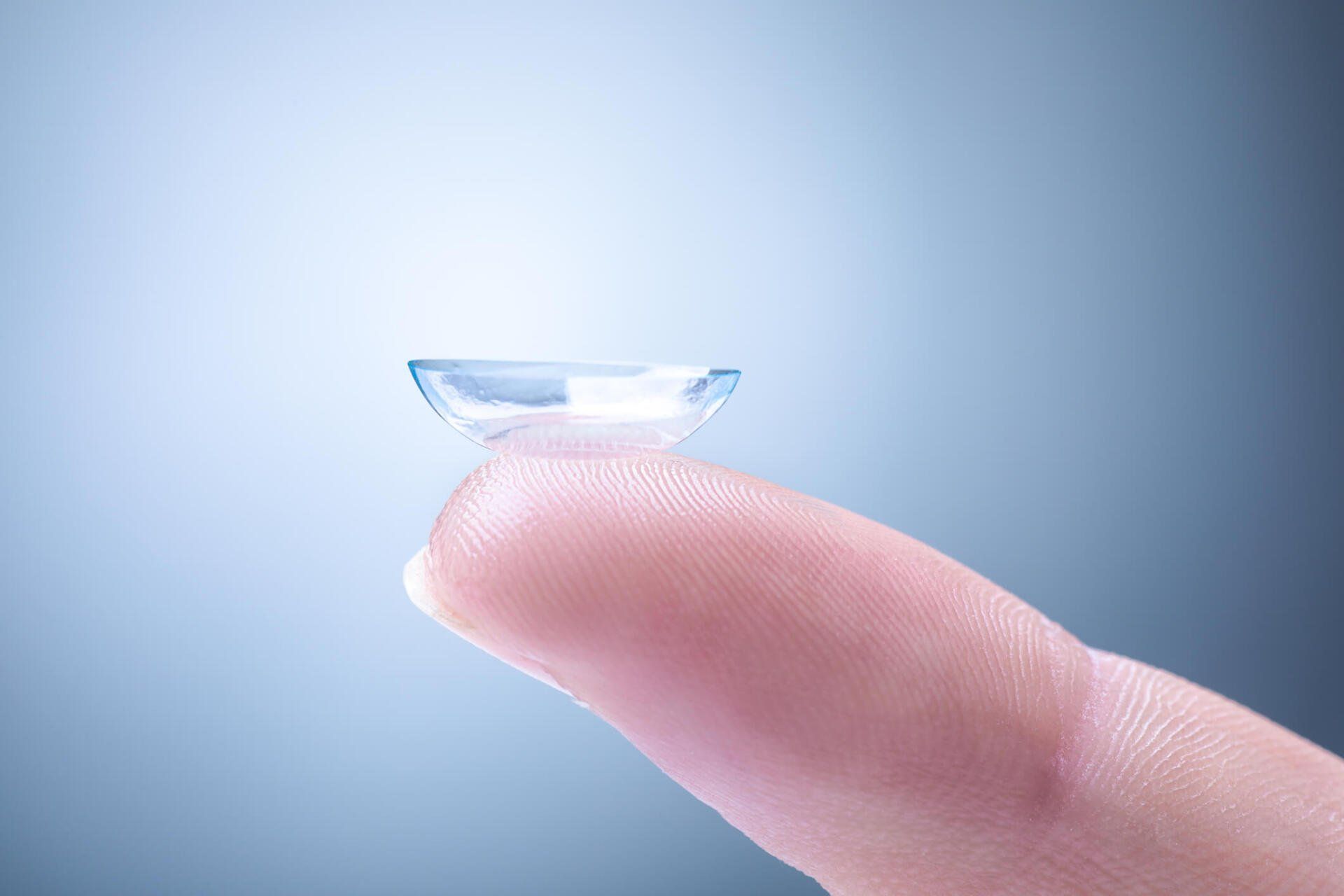 Contact Lens on a Finger — Orange, MA — Leonard Optician Inc.