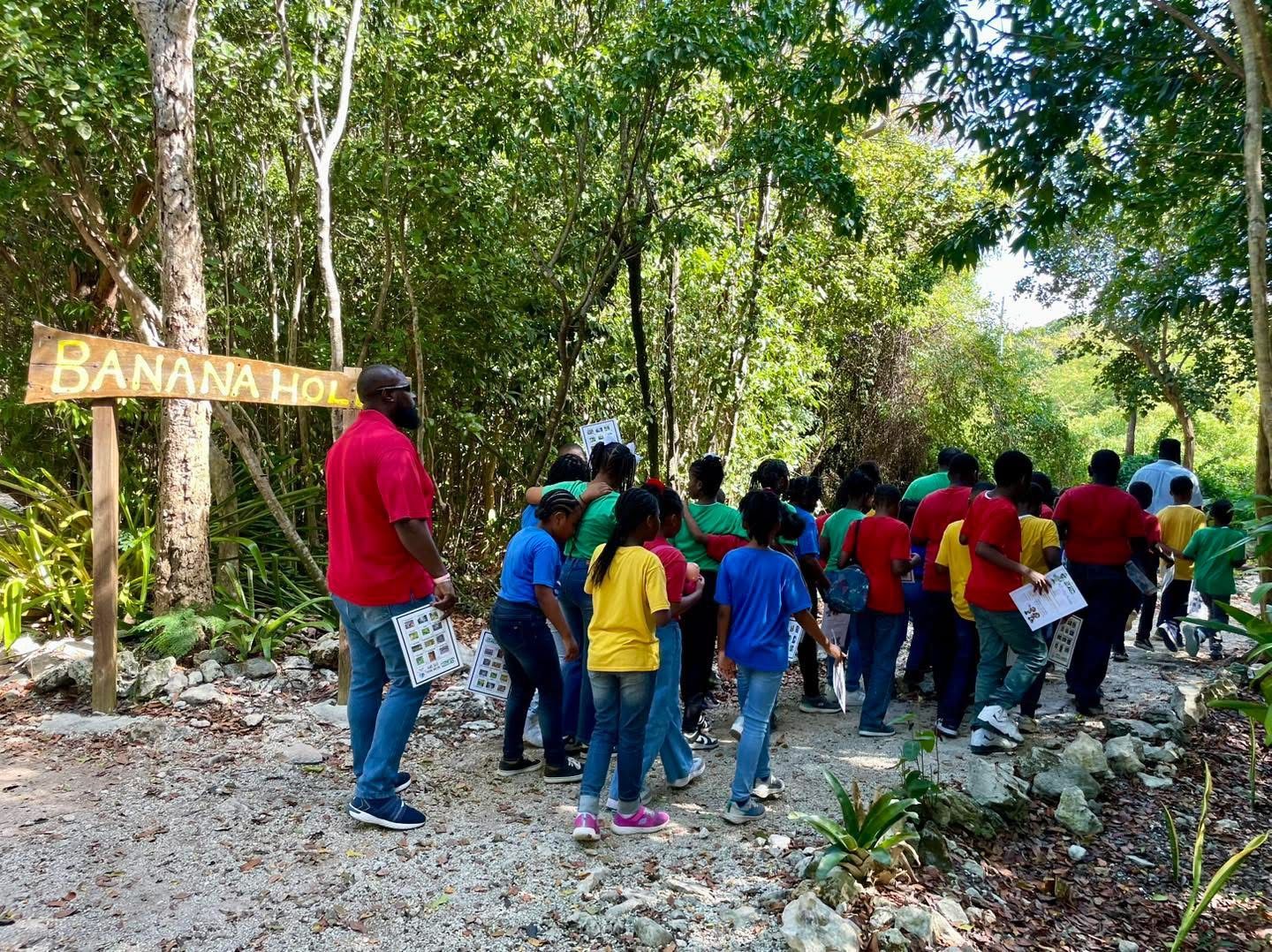 Group of students walking on a path near a 