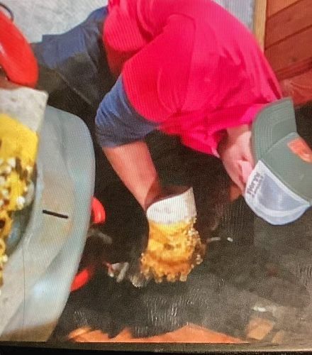 A person wearing a hat that says ' buckeyes ' on it
