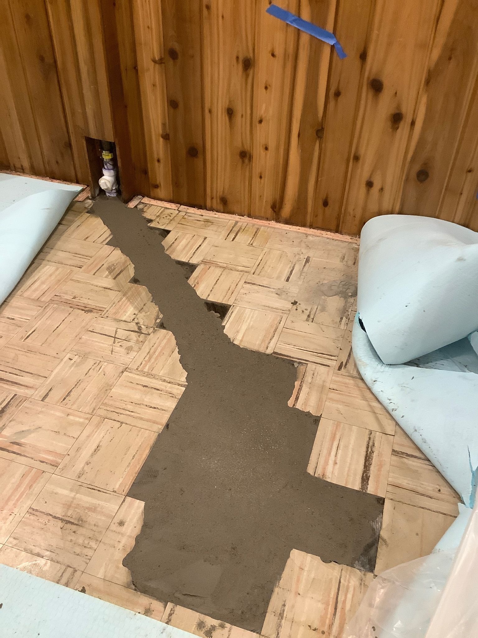 There is a hole in the floor that looks like a river.