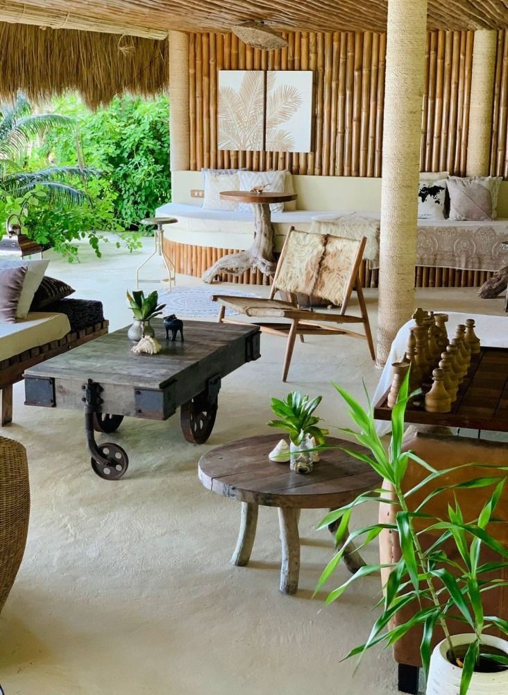 A living room filled with furniture and a table with wheels.