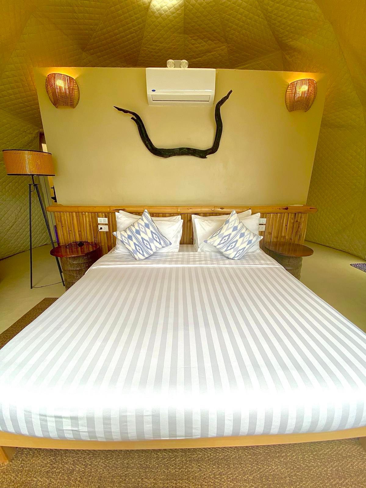 There is a large bed in the middle of the room.