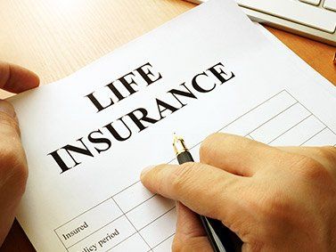 Auto Insurance — Life Insurance Policy on a Table in Chicago Heights, IL
