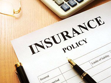 Auto Insurance — Insurance Policy on a Desk in Chicago Heights, IL
