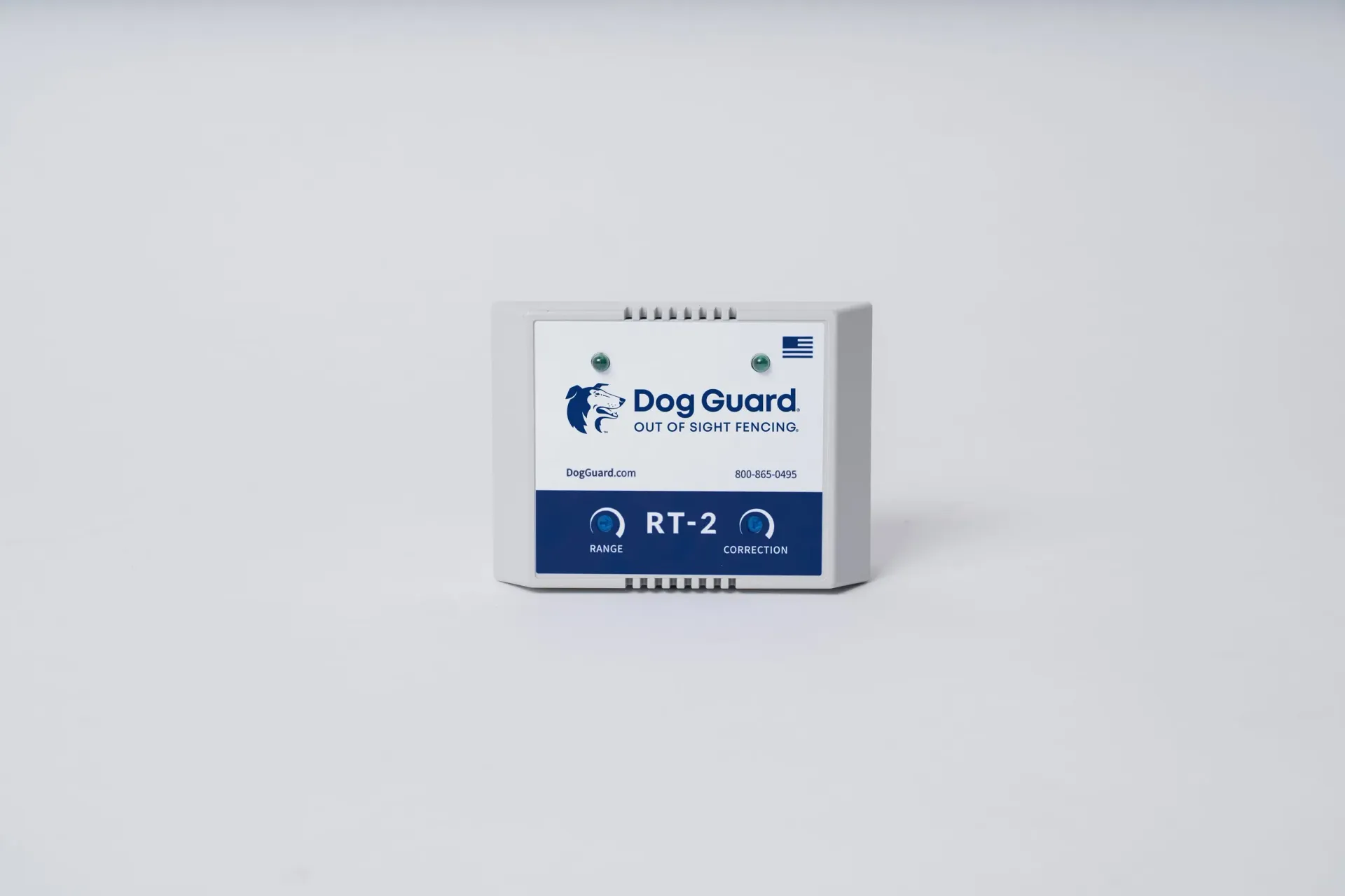 A white DogGuard RT-2 electronic transmitter unit for pet containment systems isolated on a plain background.