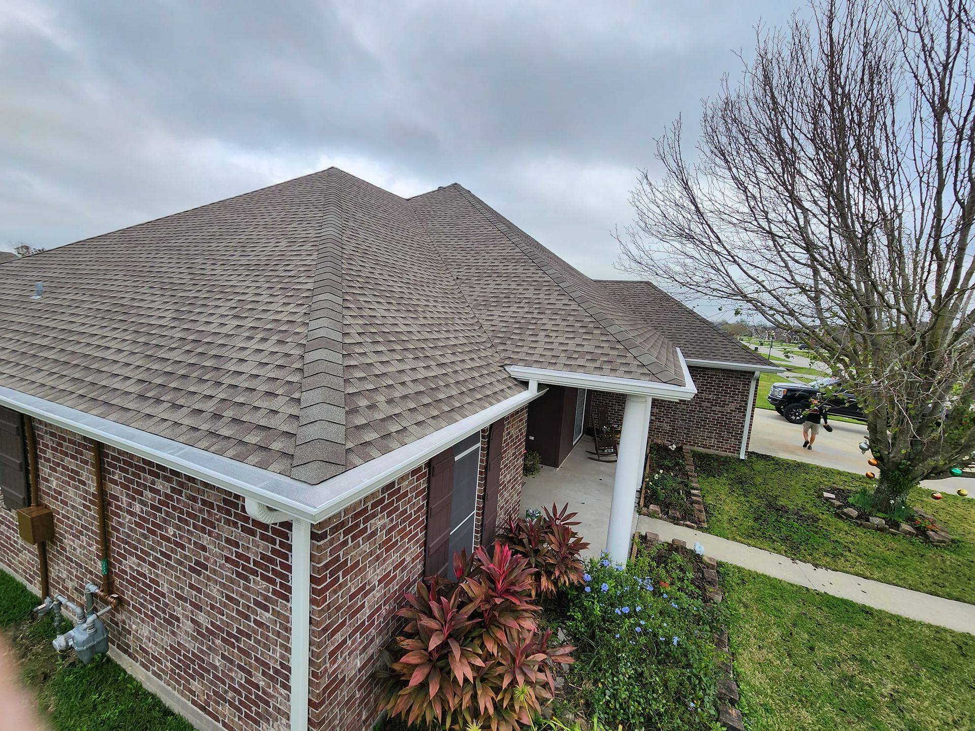 Asphalt Roof with Gutter Guard — Raceland, LA — Spartan Home Solutions LLC