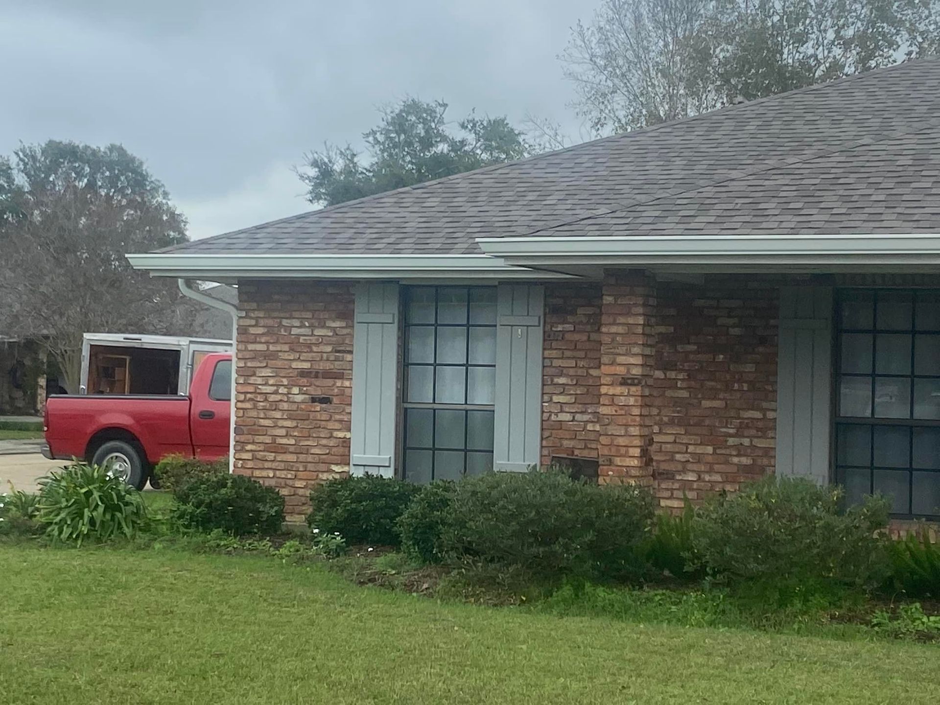 House with New Gutter — Raceland, LA — Spartan Home Solutions LLC