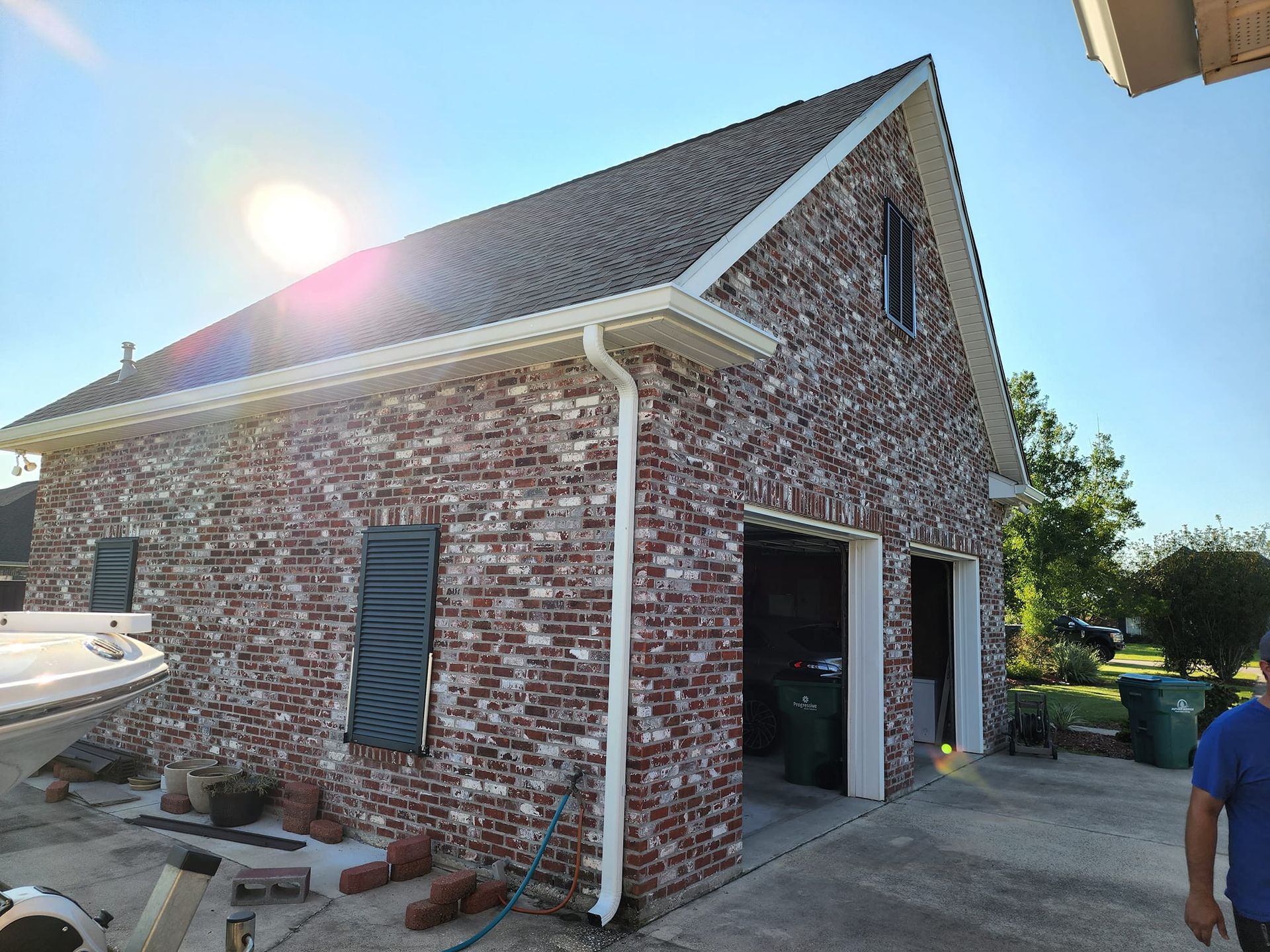 Brick Garage with New Gutter — Raceland, LA — Spartan Home Solutions LLC