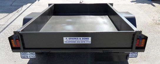 f sparks and sons trailer with business name