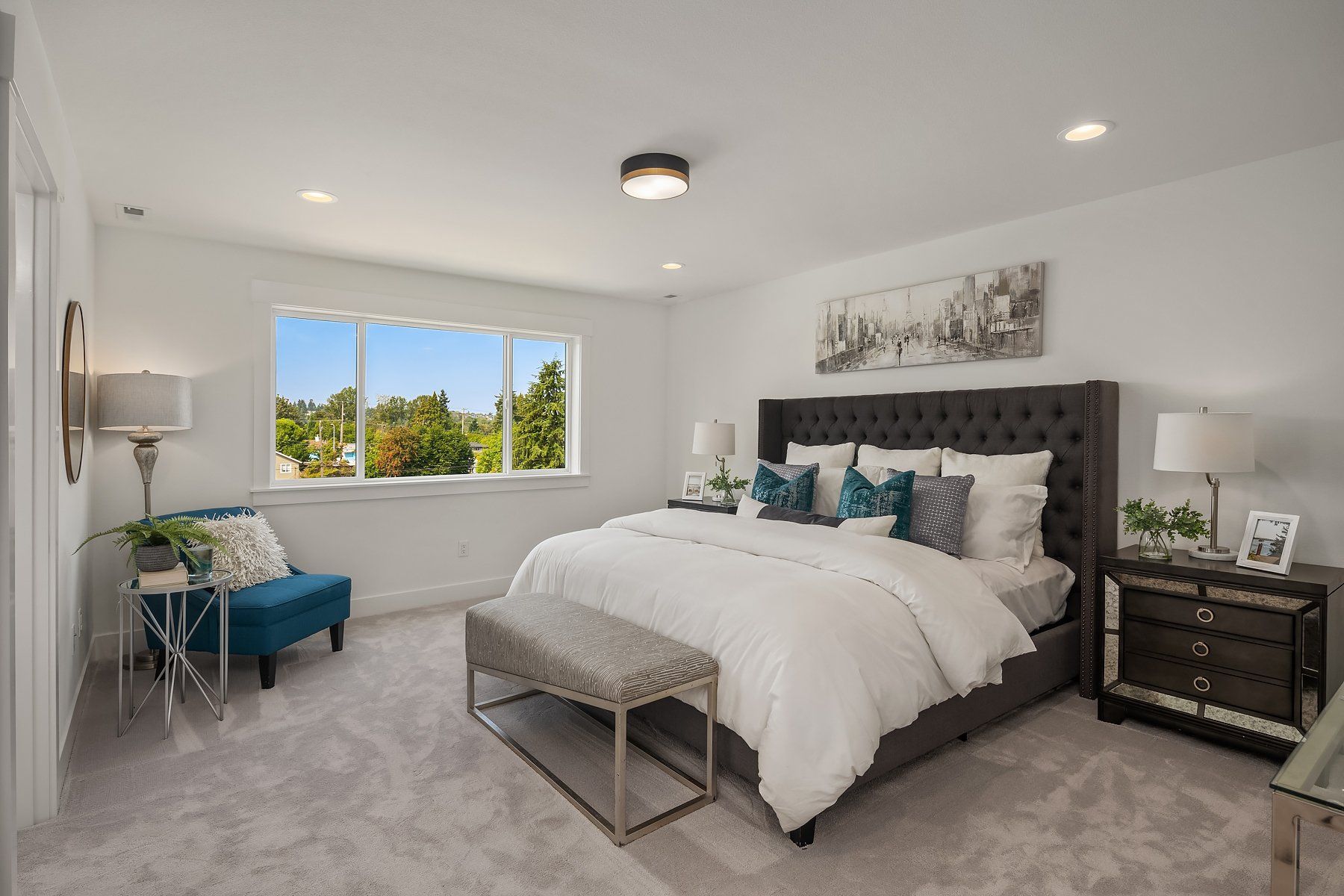 There is a large bed in the middle of the room.