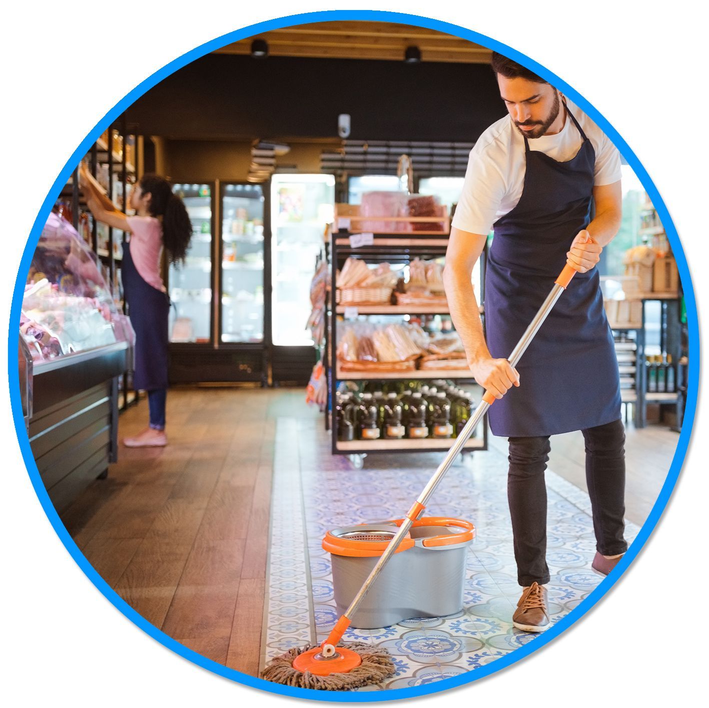 A man is mopping the floor in a store