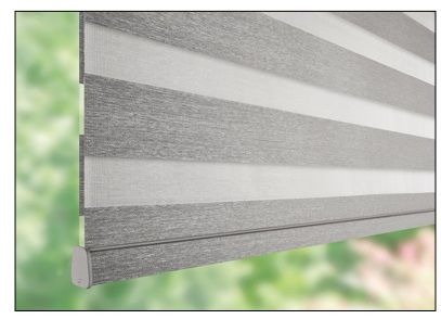 A close up of a gray and white striped blind on a window.