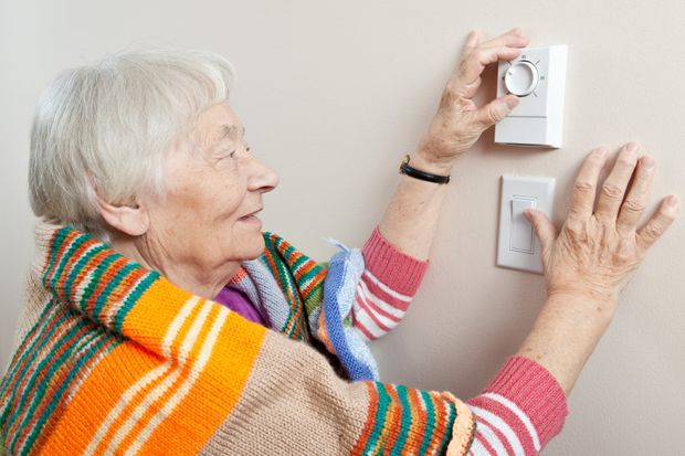 A woman who needs a heating repair in her home in Ocala, FL