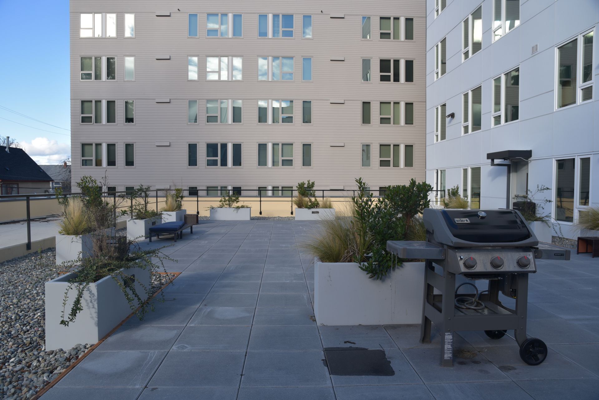 photo of the building and courtyard with bbq area 