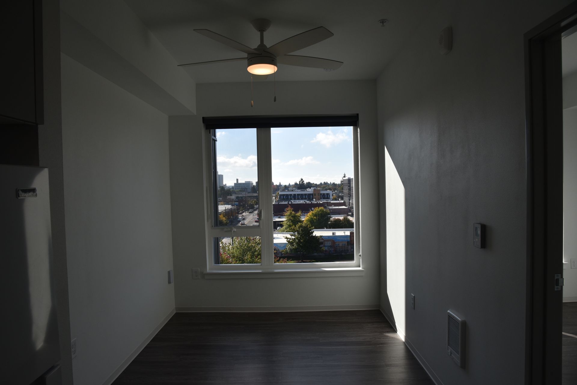 small room with a large window