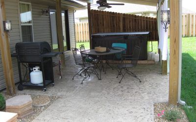 House Patio with Grill and Set of Chairs — Springfield, MO — Nixa Lawn Service