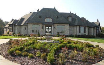 Landscaping and A Fountain in The Center of The Driveway — Springfield, MO — Nixa Lawn Service