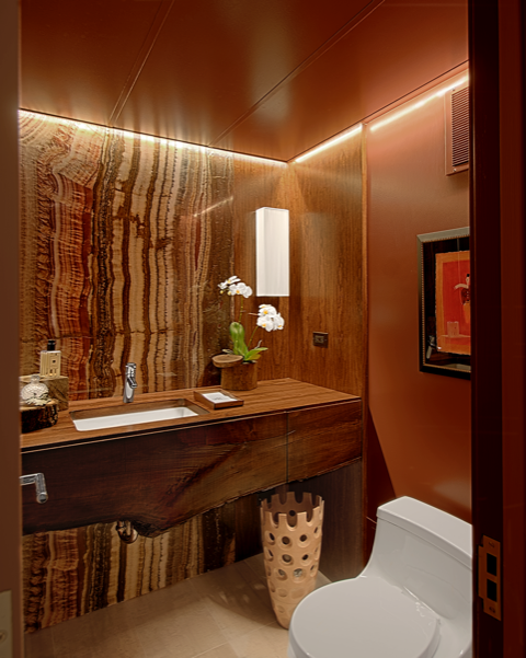A bathroom with a bathtub and a shower stall with a glass door.