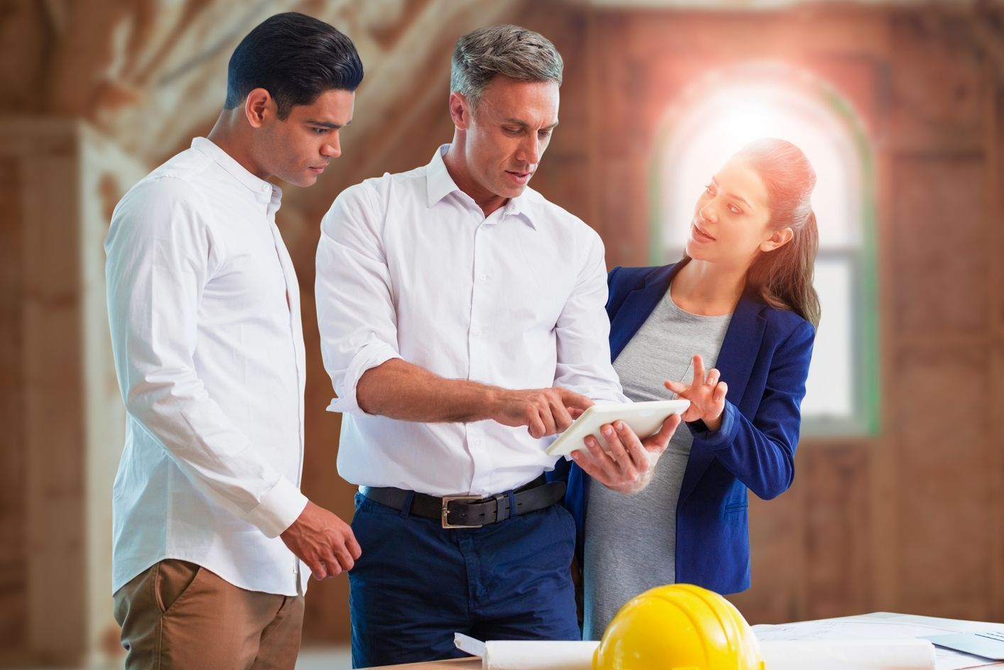 A bathroom with a marble counter top and a floral wallpaper