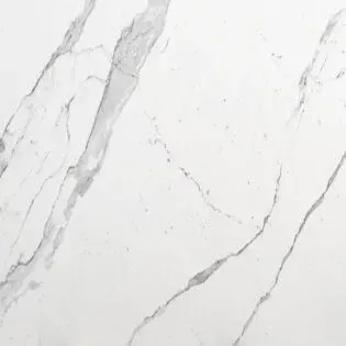 A close up of a white marble counter top.