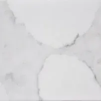 A close up of a white marble tile with a marble texture.