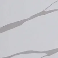 A close up of a white marble counter top with a gray marble texture.