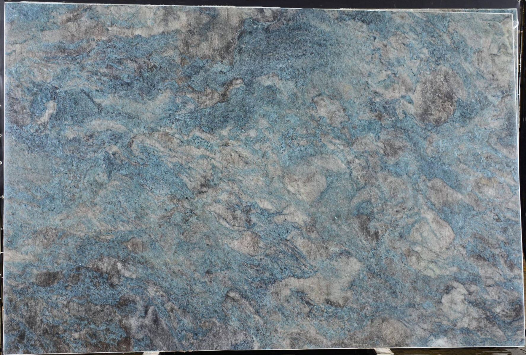 A blue and white tile with a marble texture