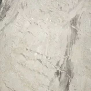 A close up of a white marble counter top.
