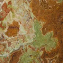 A close up of a brown and green marble texture.