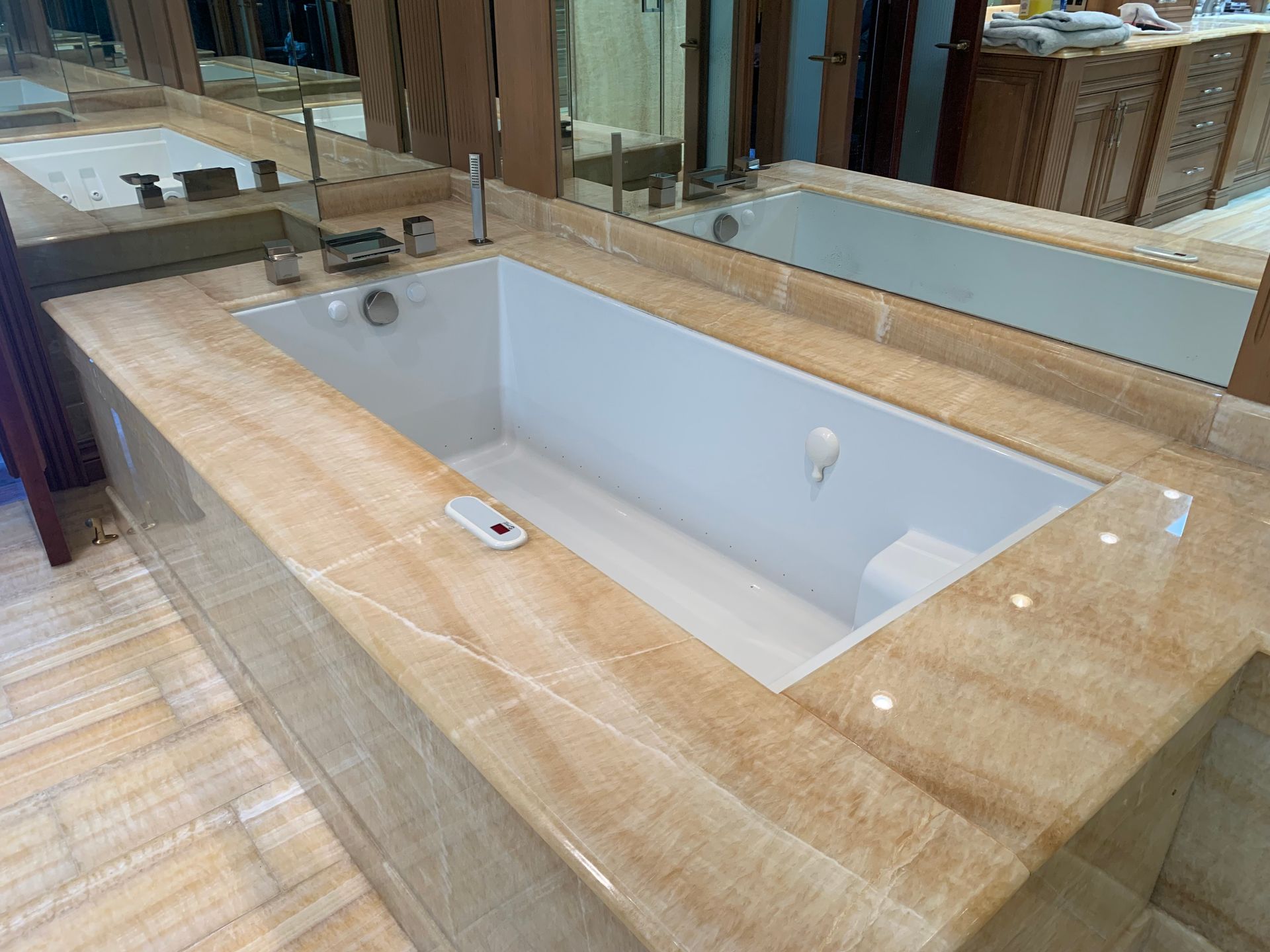 A bathroom with a walk in shower and a toilet.