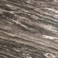 A close up of a granite counter top with a marble texture.