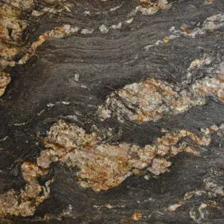 A close up of a granite counter top with a marble texture.