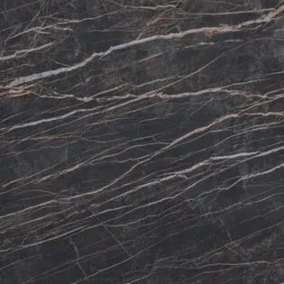 A close up of a black marble counter top.