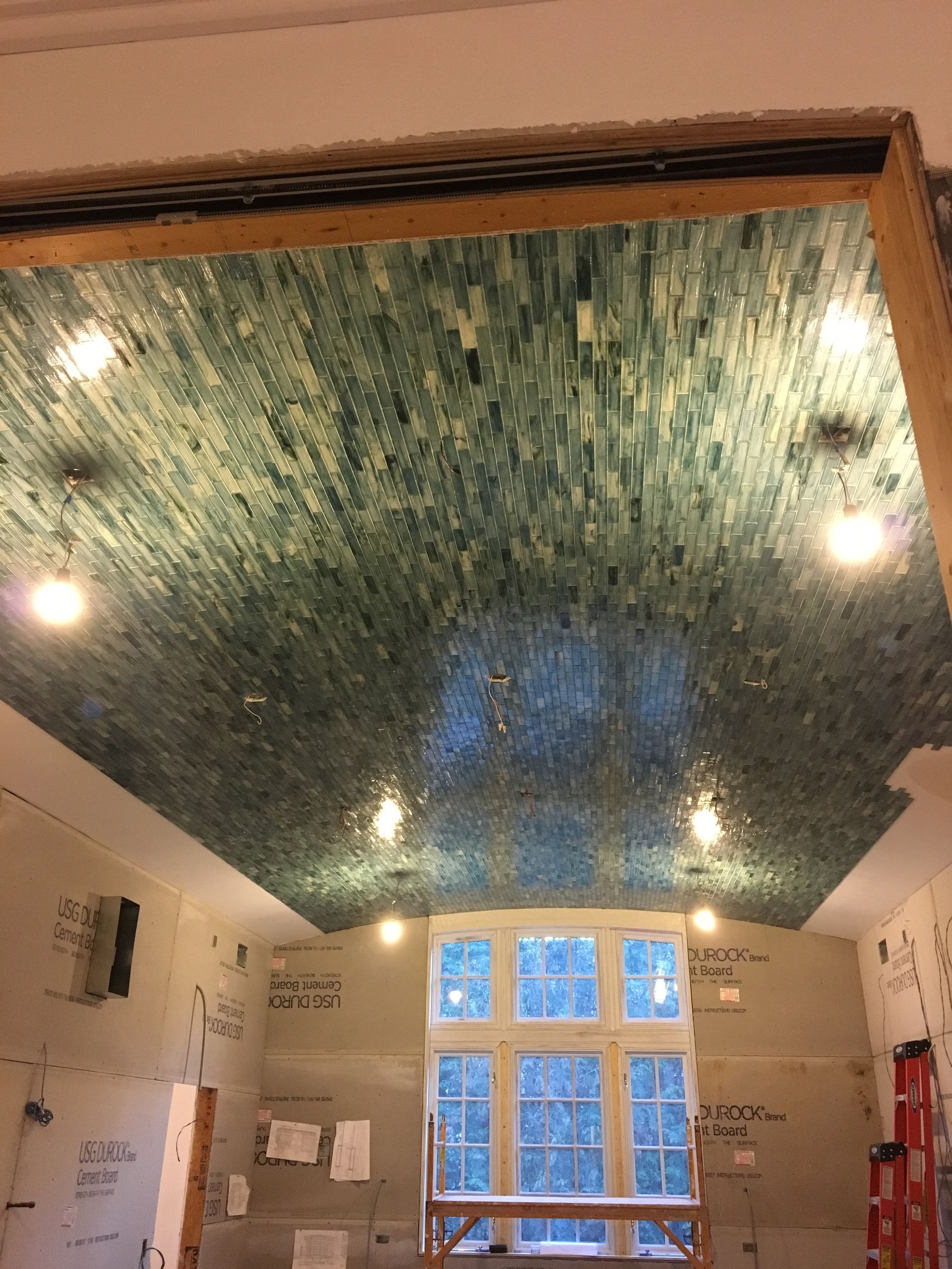 A room with a ceiling that is being remodeled