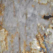 A close up of a granite counter top with a marble texture.