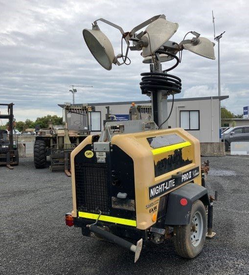 A Yellow and Black Vehicle with The Word Night light on It — NQ Trading In Edmonton, QLD