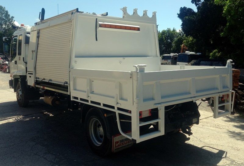 A White Truck is Parked on the Side of the Road — NQ Trading in Townsville, QLD