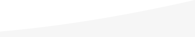 A close up of a white triangle on a white background.