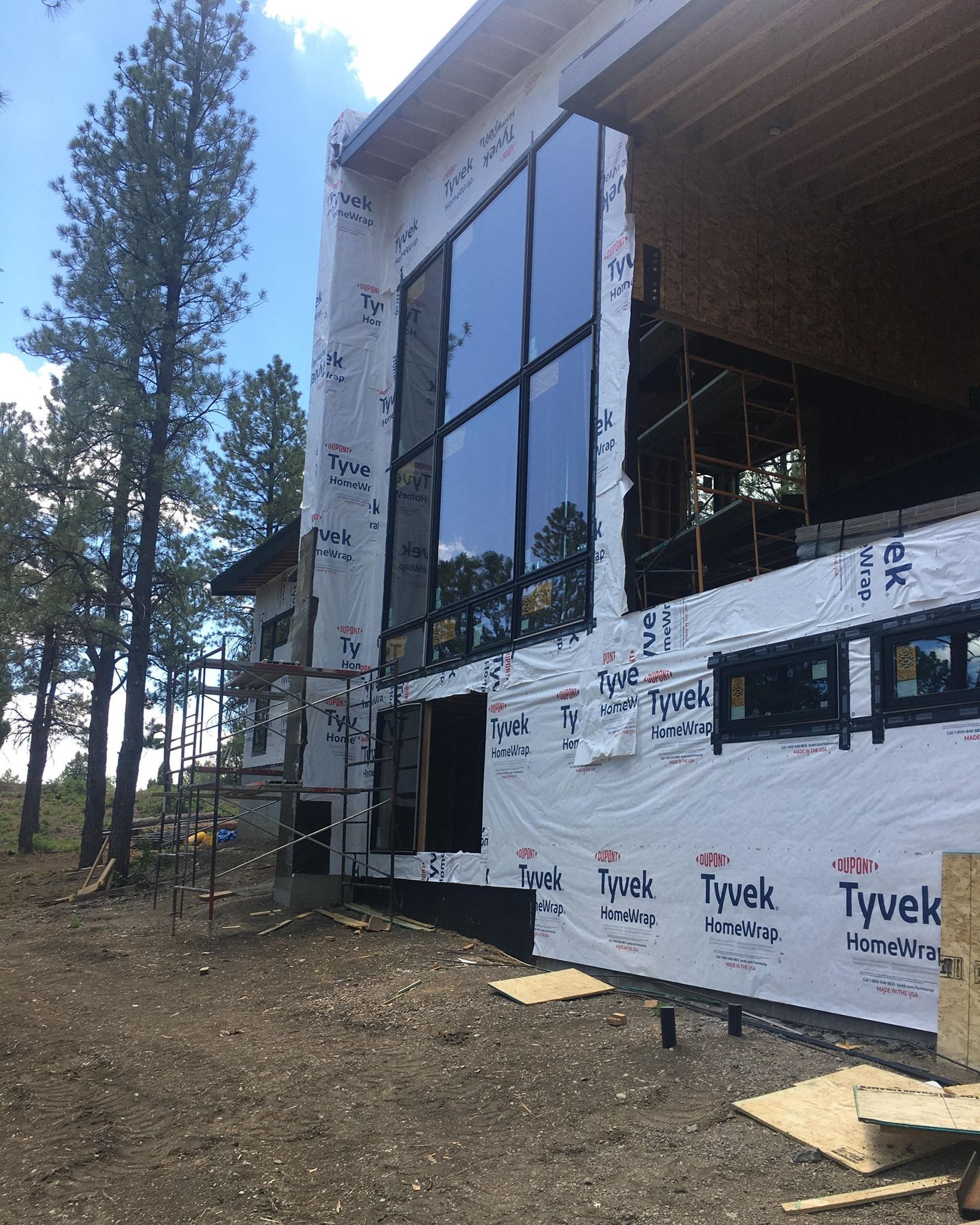 a school cafeteria with lots of windows installed by Sunglass
