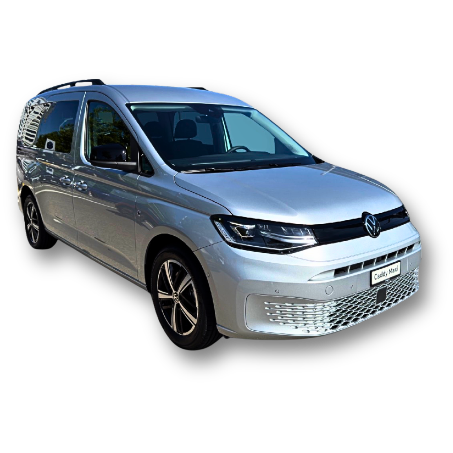 Weisser Volkswagen Caddy Van mit schwarzer Verkleidung und Rädern.