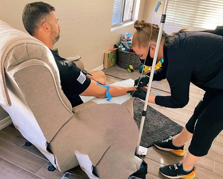 Hangover IV therapy Las Vegas - nurse delivering mobile IV treatment to hotel room