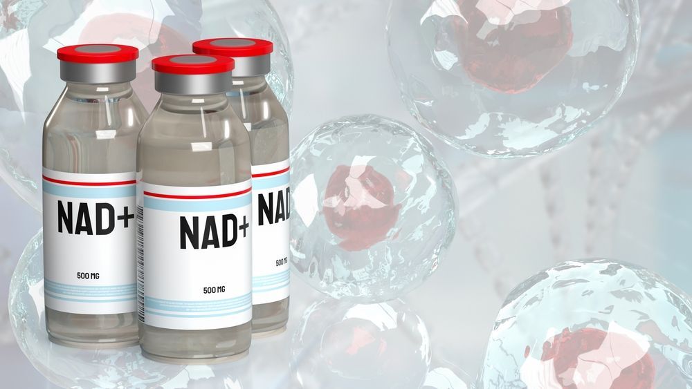 Three bottles of nad + nad + nad are sitting next to each other on a table.