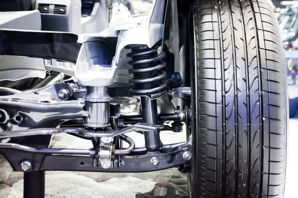 A Close Up of a Car Suspension and Tyre — Forster Mechanical Repairs & Servicing In Forster, NSW