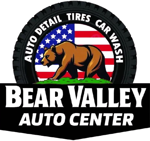 Bear Valley Auto Center logo with bear, U.S. flag, and text for auto detail, tires, and car wash
