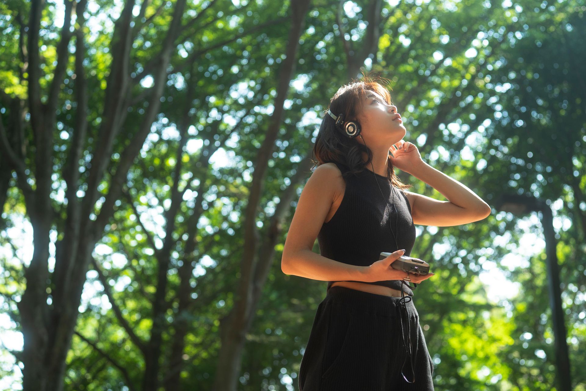 With the support of biologics for asthma, a woman enjoys summer days without fear of heat-induced asthma symptoms.