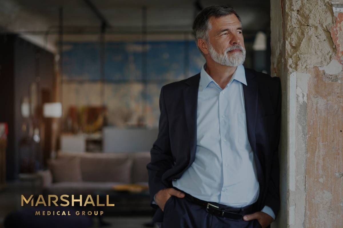 Mature executive man standing in office at Marshall Lifestyle Medicine near Louisville, Kentucky