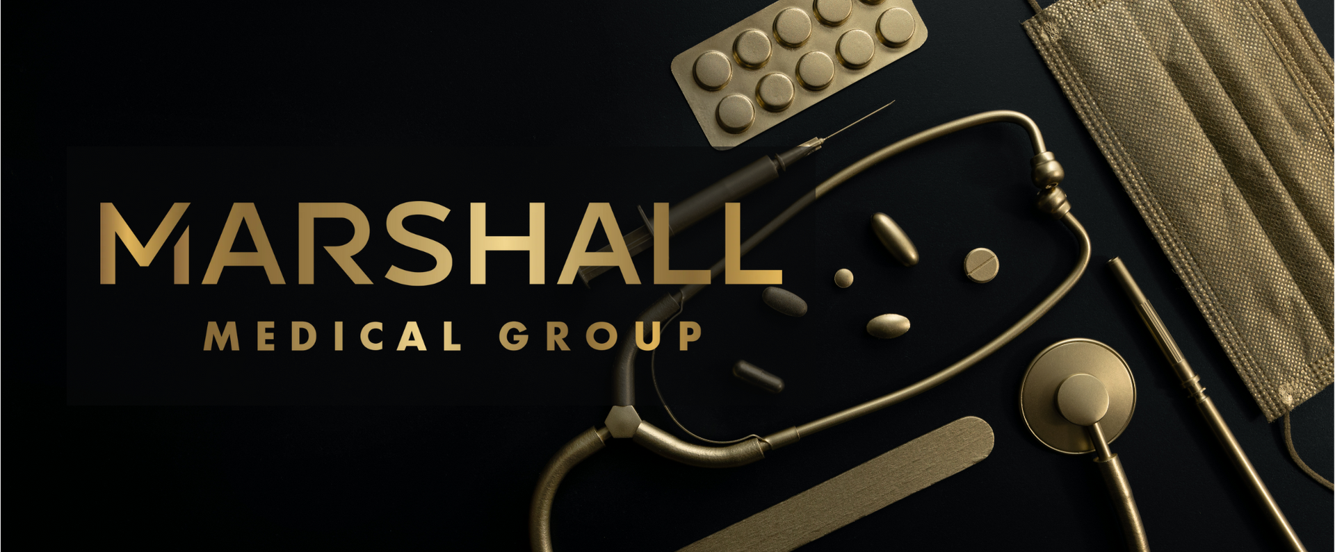 The Marshall Medical Group logo on an image of doctor’s tools