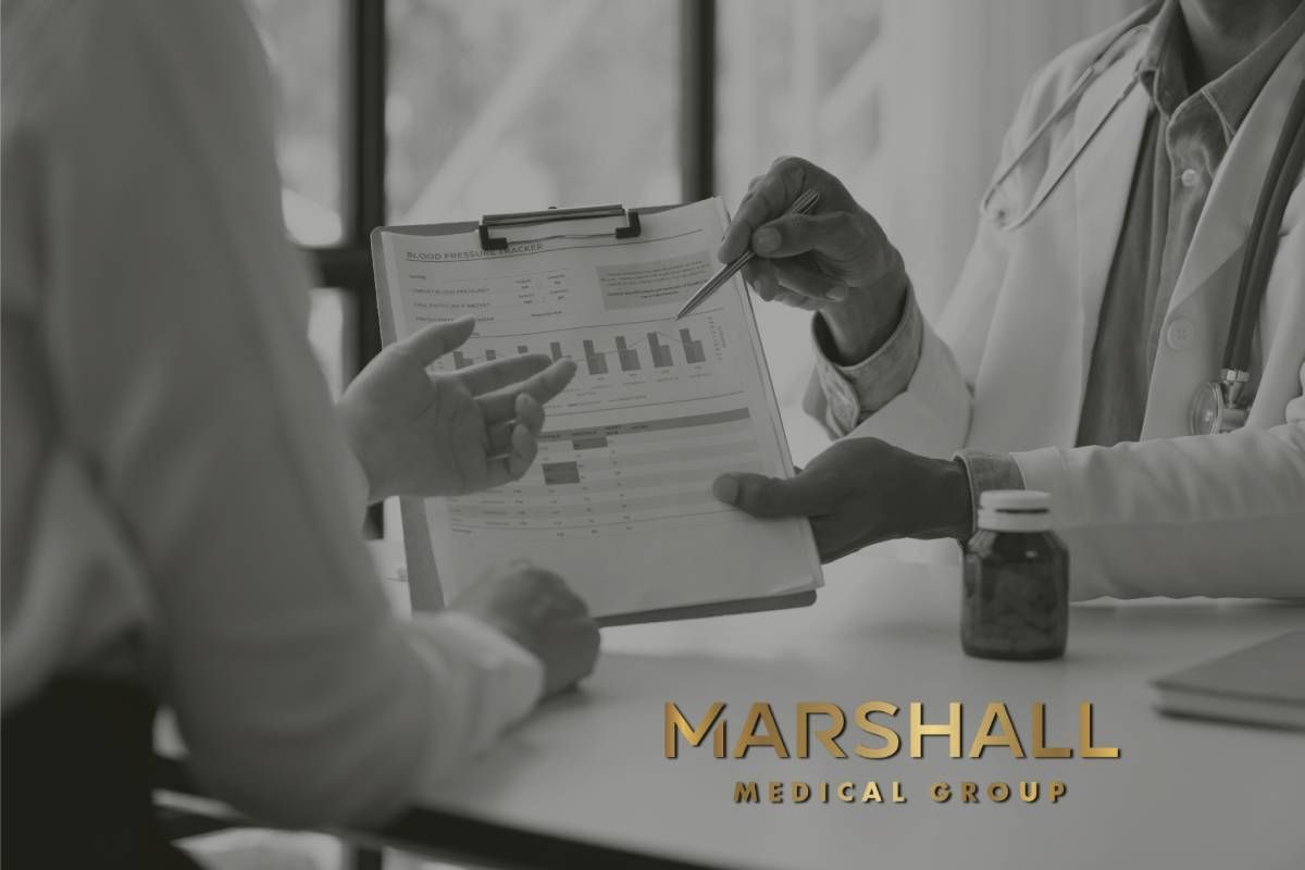 Professional doctor explains and discusses hormone level details at Marshall Lifestyle Medicine near