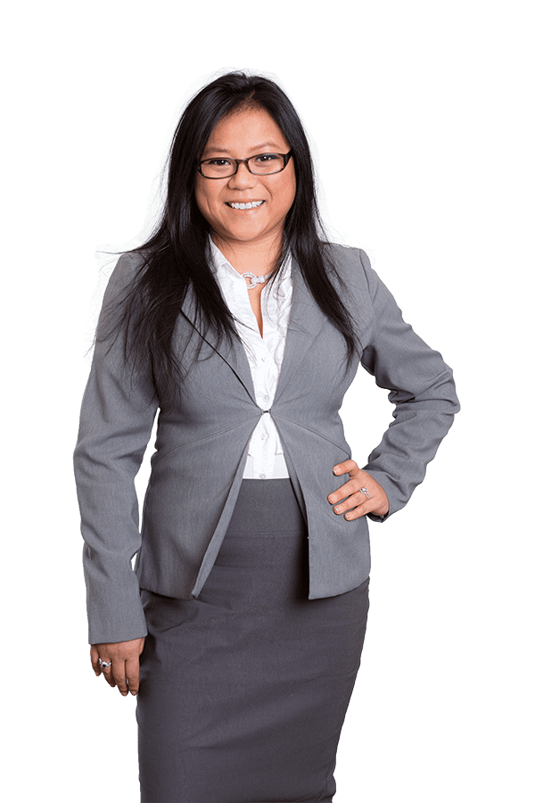 Three men in business attire pose outside a building, one with sunglasses, next to a blue art sculpture.